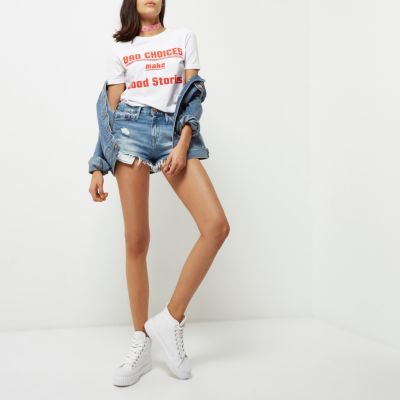 Light blue wash mid rise ripped hot pants